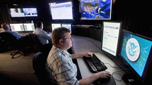 Analysts work in a watch and warning center of a cyber security defense lab at the Idaho National Laboratory