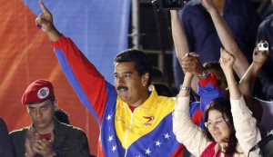 Venezuelan presidential candidate Maduro and wife celebrate after the official results gave him a victory in Caracas